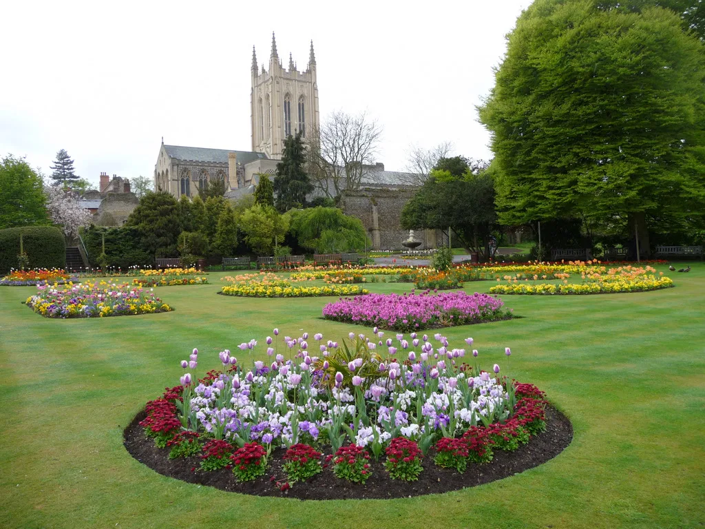 The Abbey Gardens in spring, with the cathedral tower behind